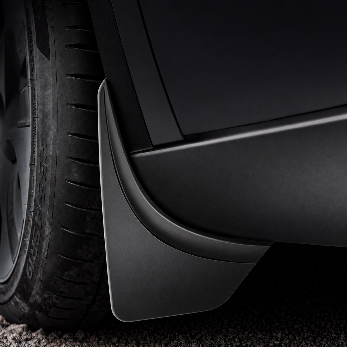 Coverage behind the wheel. A shaped flap follows the wheel-arch edge.