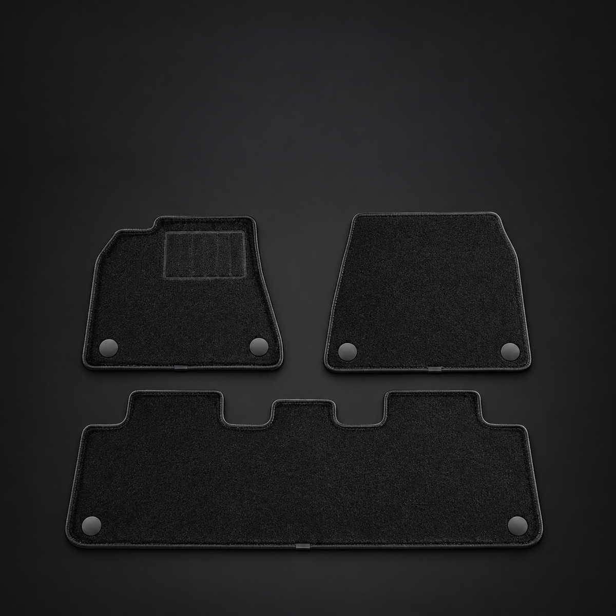 SEPARATE CARPET INSERTS. A removable layer shown alongside the molded mats. Product photo without text.