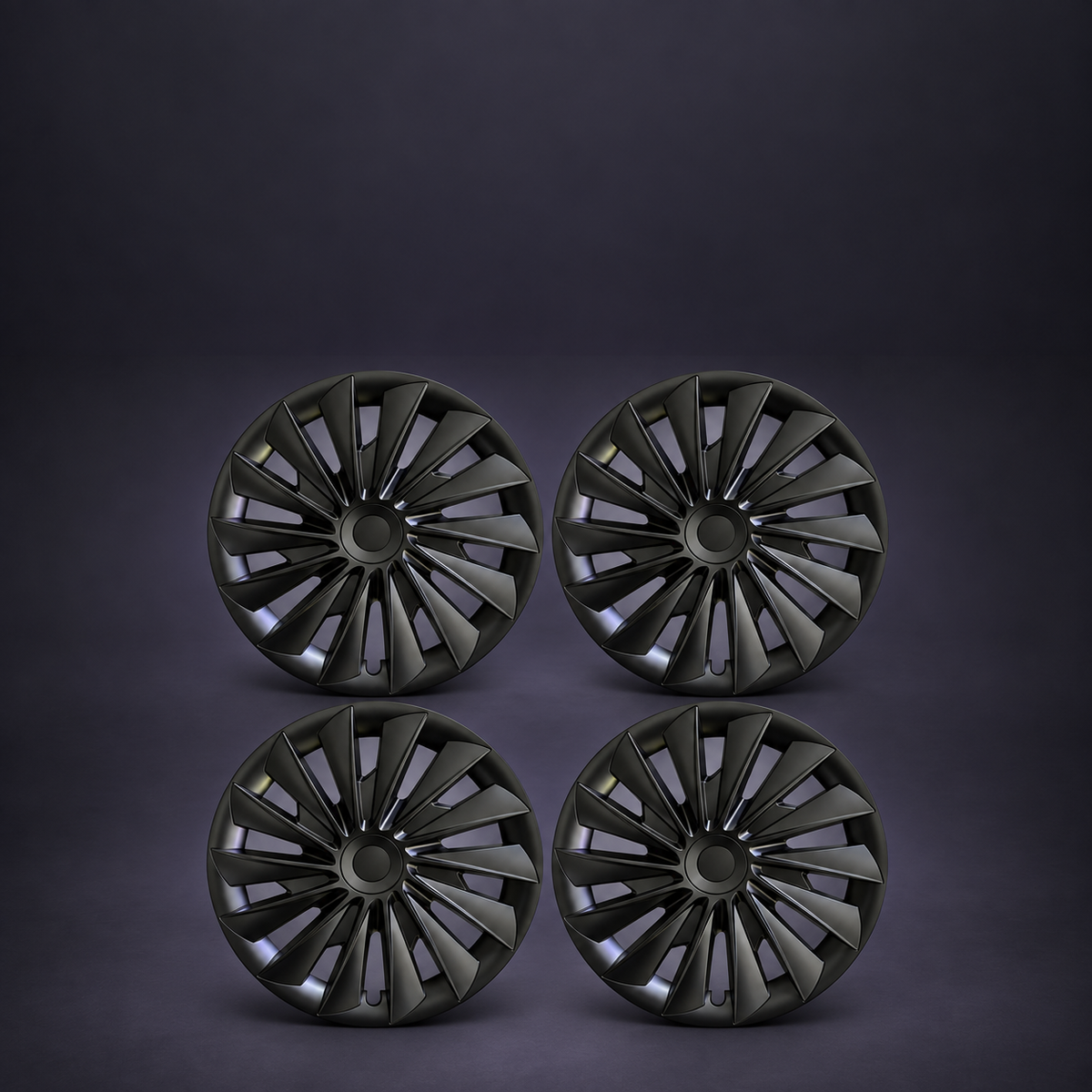 Four matching matte-black multi-spoke wheel covers; wheels and tires are not included.