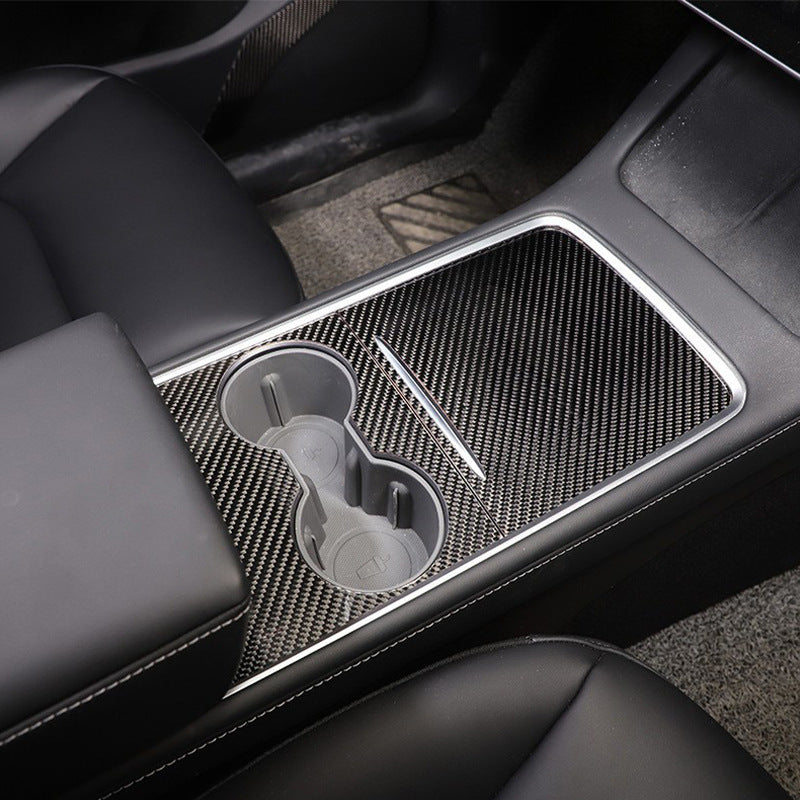 Carbon-style center console trim surrounding the two cup holders
