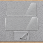 Two uninstalled clear display protector sheets and a folded gray cloth on a plain felt inspection mat.