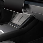 Carbon-style U-shaped trim around a wireless charging area