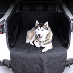 Dog resting on a quilted cargo liner with the rear hatch open