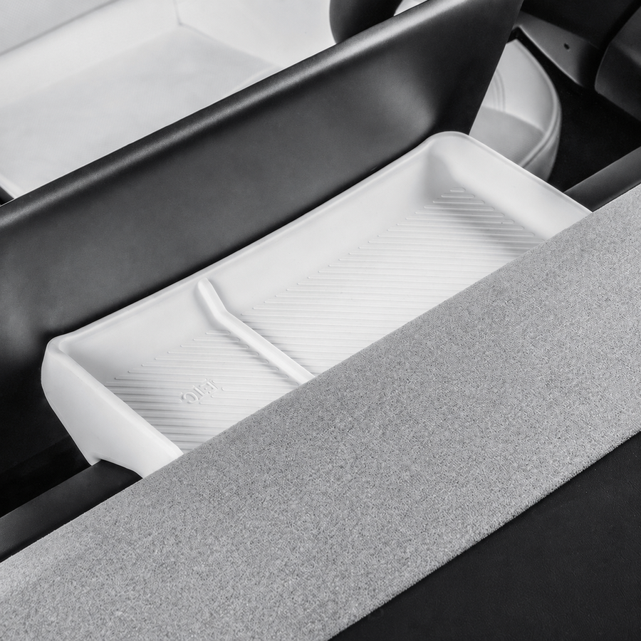 One white divided silicone tray shown in place beside the original console surfaces.