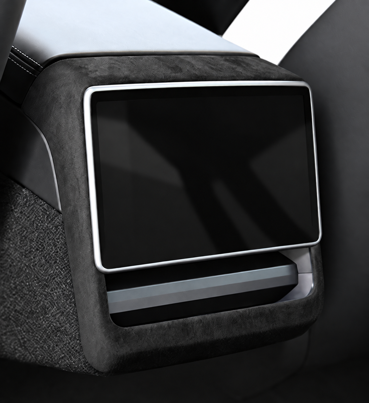Dark suede-style trim around a switched-off rear display and air outlet
