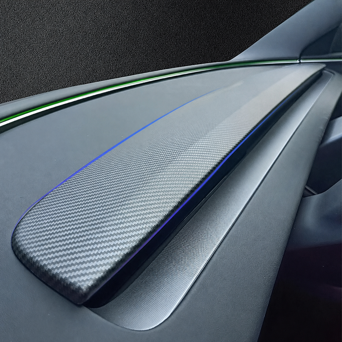 Carbon-style upper and lower dashboard trim shown in a close-up cabin view