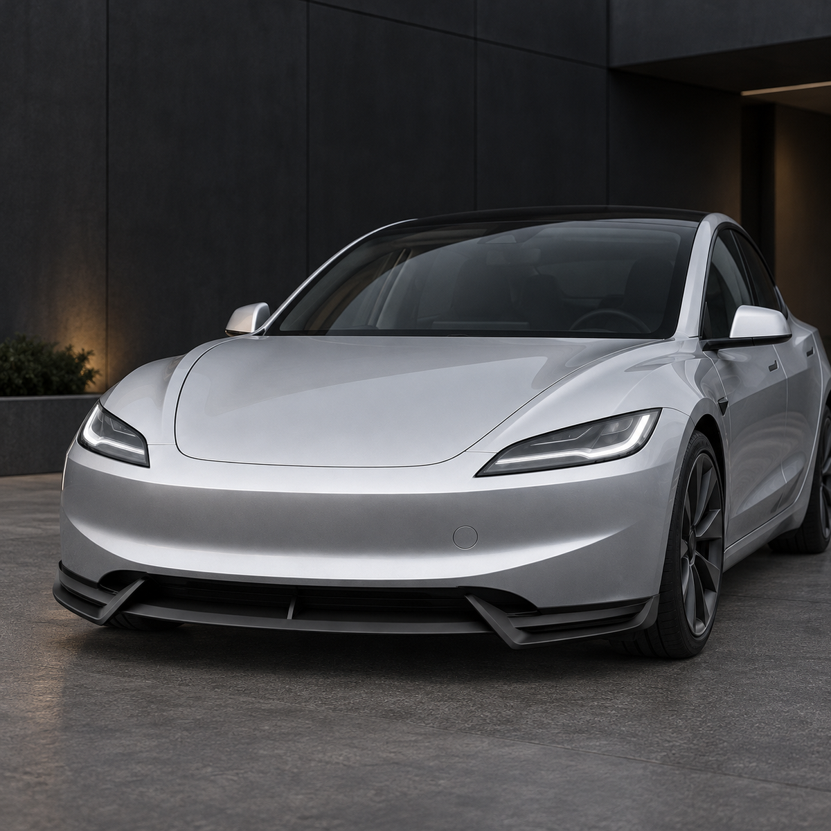 Matte-black front splitter installed on a silver Tesla Model 3 Highland
