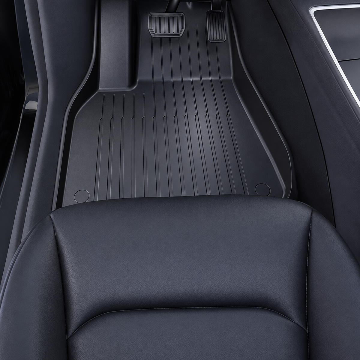 Supplier installation reference of a black molded TPE driver floor mat with raised sides and channels. AI-assisted cleanup.