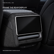 Charcoal suede-finish trim around a rear passenger display and vent opening.