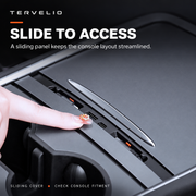 Finger sliding the charging hub cover beside the USB-A and USB-C sockets.