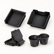 Four-piece console organizer and cup holder set for the supplier-listed refreshed Model Y configuration.