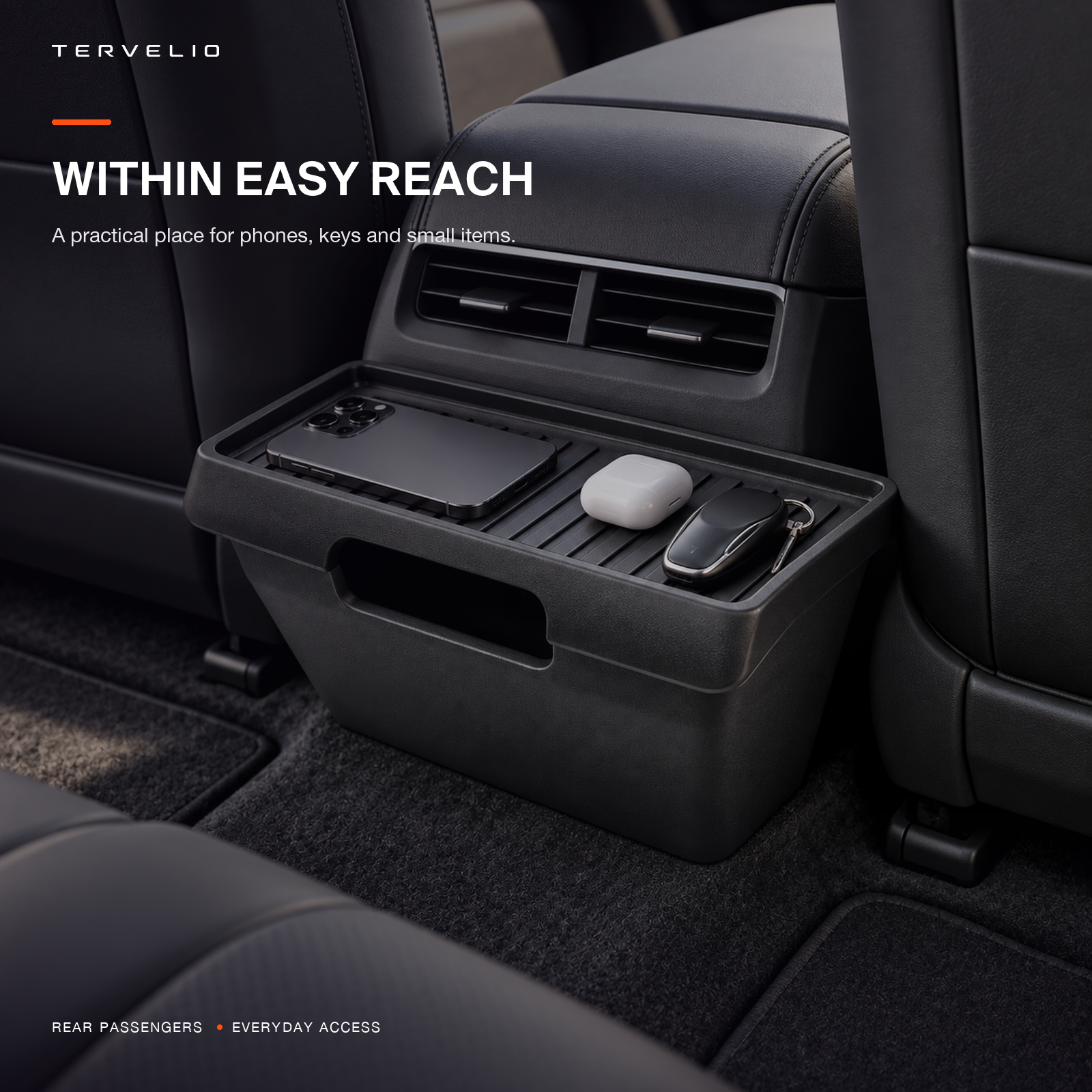 Rear-seat storage box positioned behind the center console with small daily essentials organized inside.