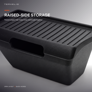 Open rear storage box with raised sides for compact everyday items.