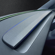 Carbon-style upper and lower dashboard trim installed in a refreshed Tesla Model 3