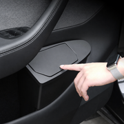 Front door trash bin lid being pressed inside the door pocket