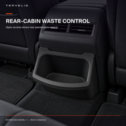 Rear-console waste bin positioned for rear-passenger access