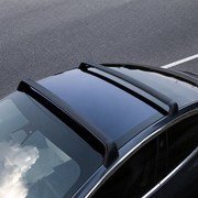 Lockable roof rack crossbars installed across the panoramic glass roof