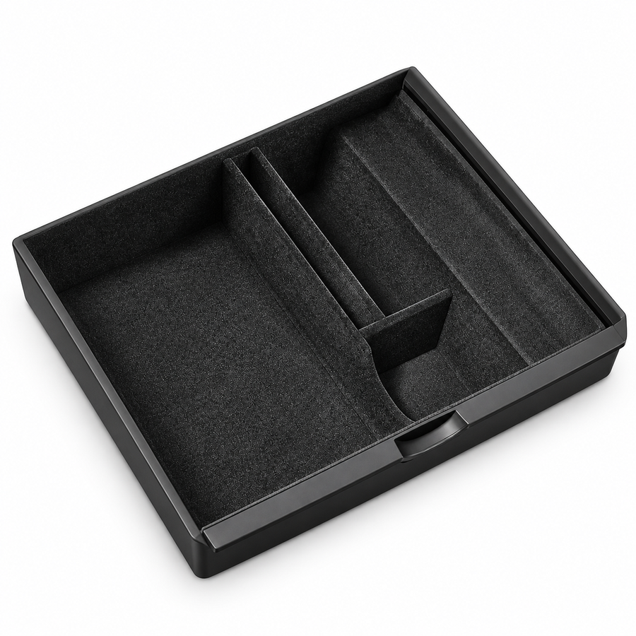 Black flocked console tray with divided compartments, shown on white.