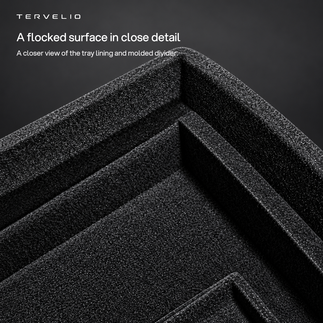 A flocked surface in close detail. A closer view of the tray lining and molded divider.