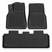 Three black cabin floor mats for Model Y isolated on white: two front mats and one wide rear mat