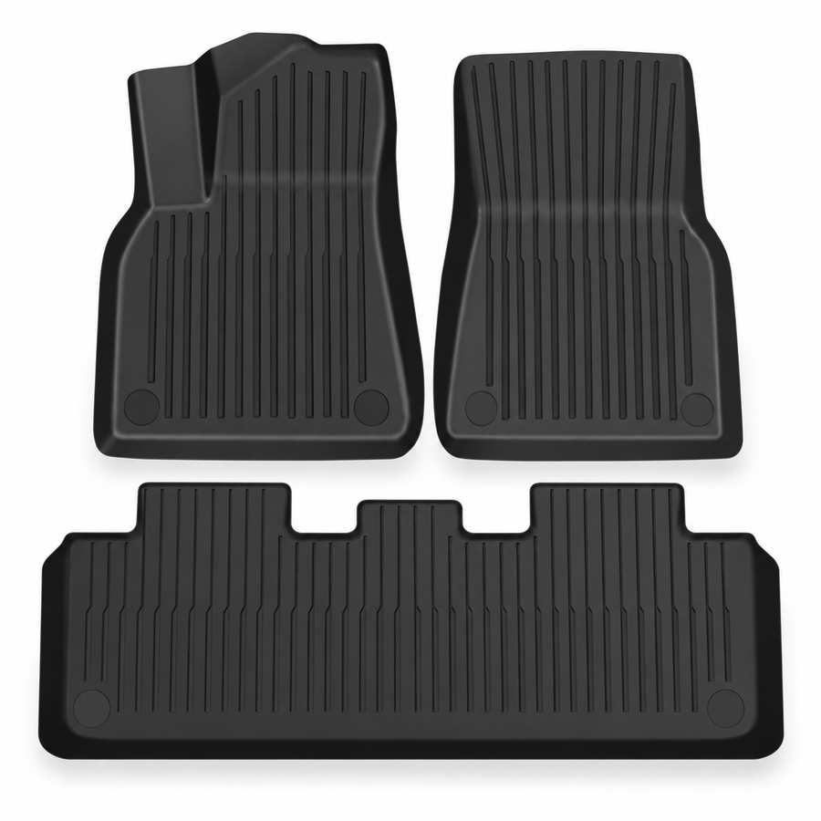 Three black cabin floor mats for Model Y isolated on white: two front mats and one wide rear mat