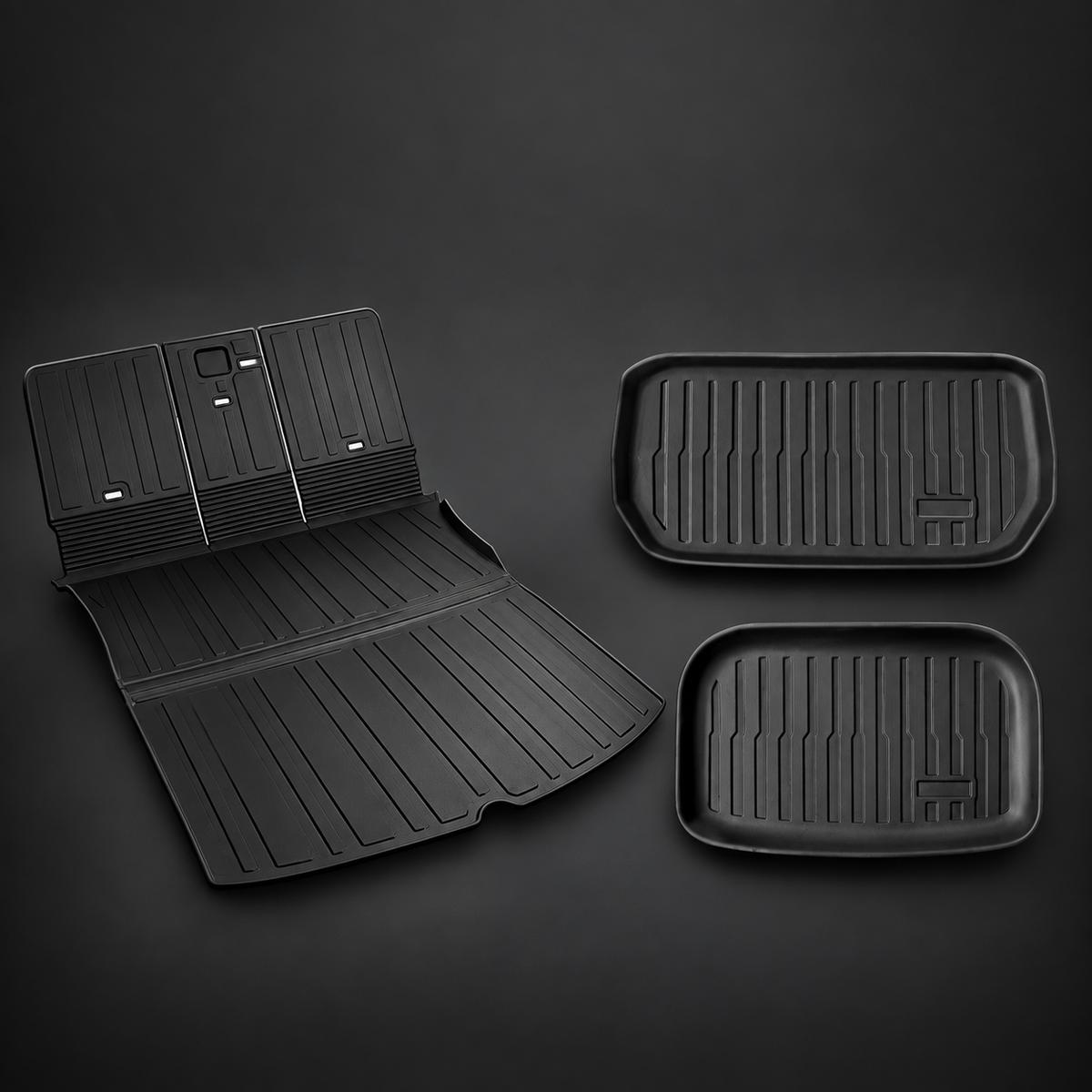 CARGO AND SEATBACK SET. Review the main liner and the separate tray mats. Product photo without text.