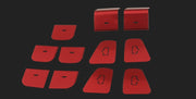 Red door window switch trim pieces shown as an eleven-piece set