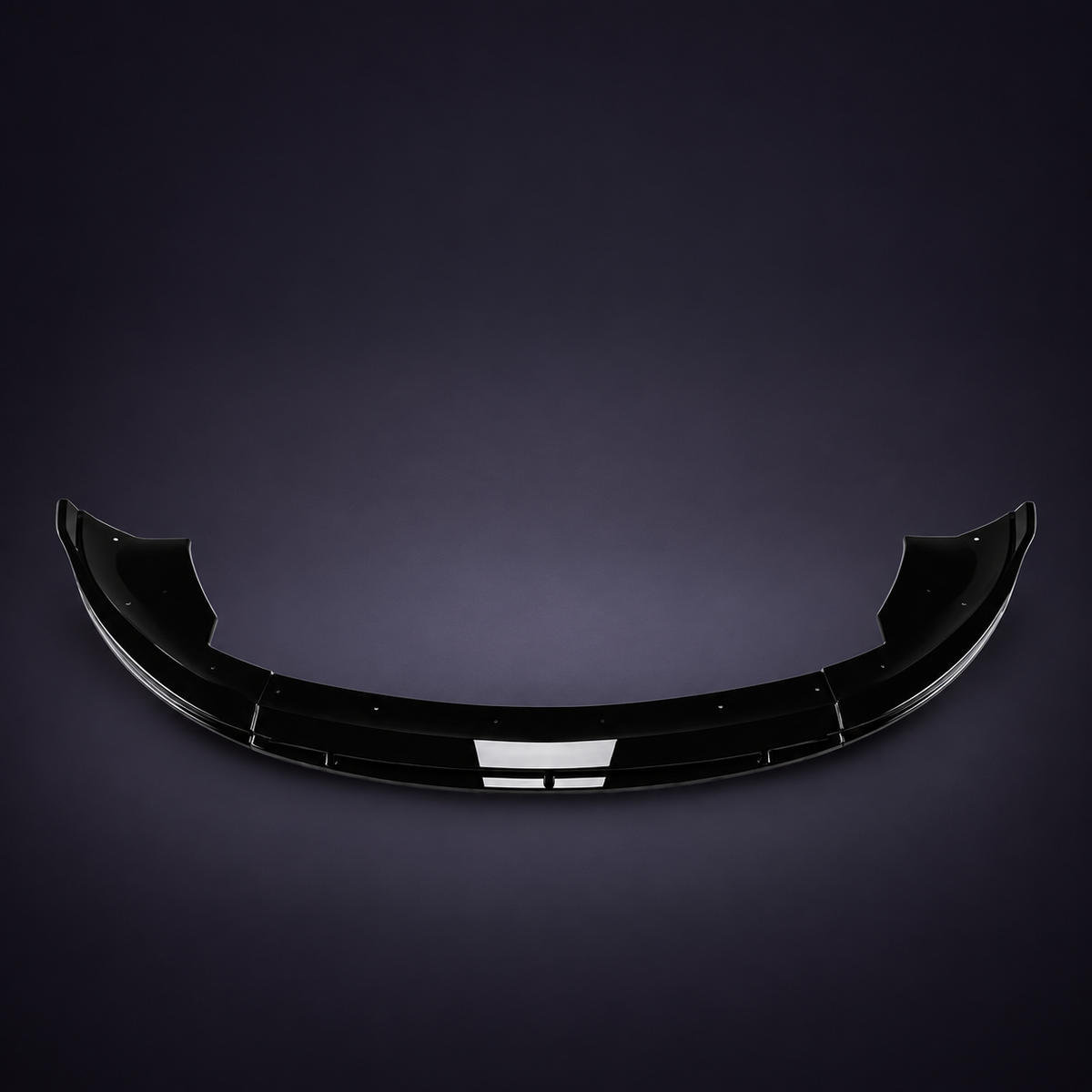 a defined lower-bumper line: Gloss black with a curved, sectional profile.
