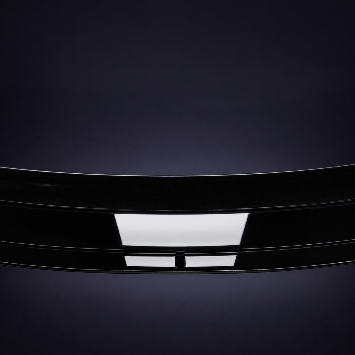 a clean gloss-black finish: A smooth surface with a reflective appearance.