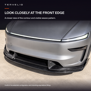 Close-up of the front lip lower edge, raised contours and visible weave pattern on the supplier's refreshed Model Y.