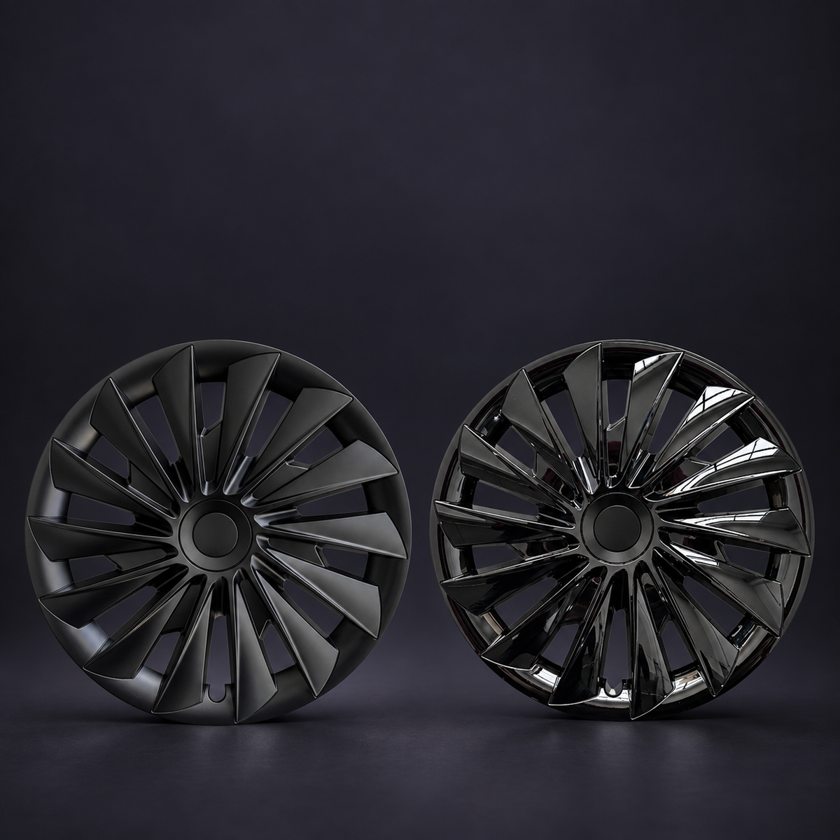 Matte-black wheel cover on the left and gloss-black wheel cover on the right.