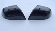 TERVELIO carbon-style side mirror cover pair from the reverse angle, showing the curved outer surfaces.