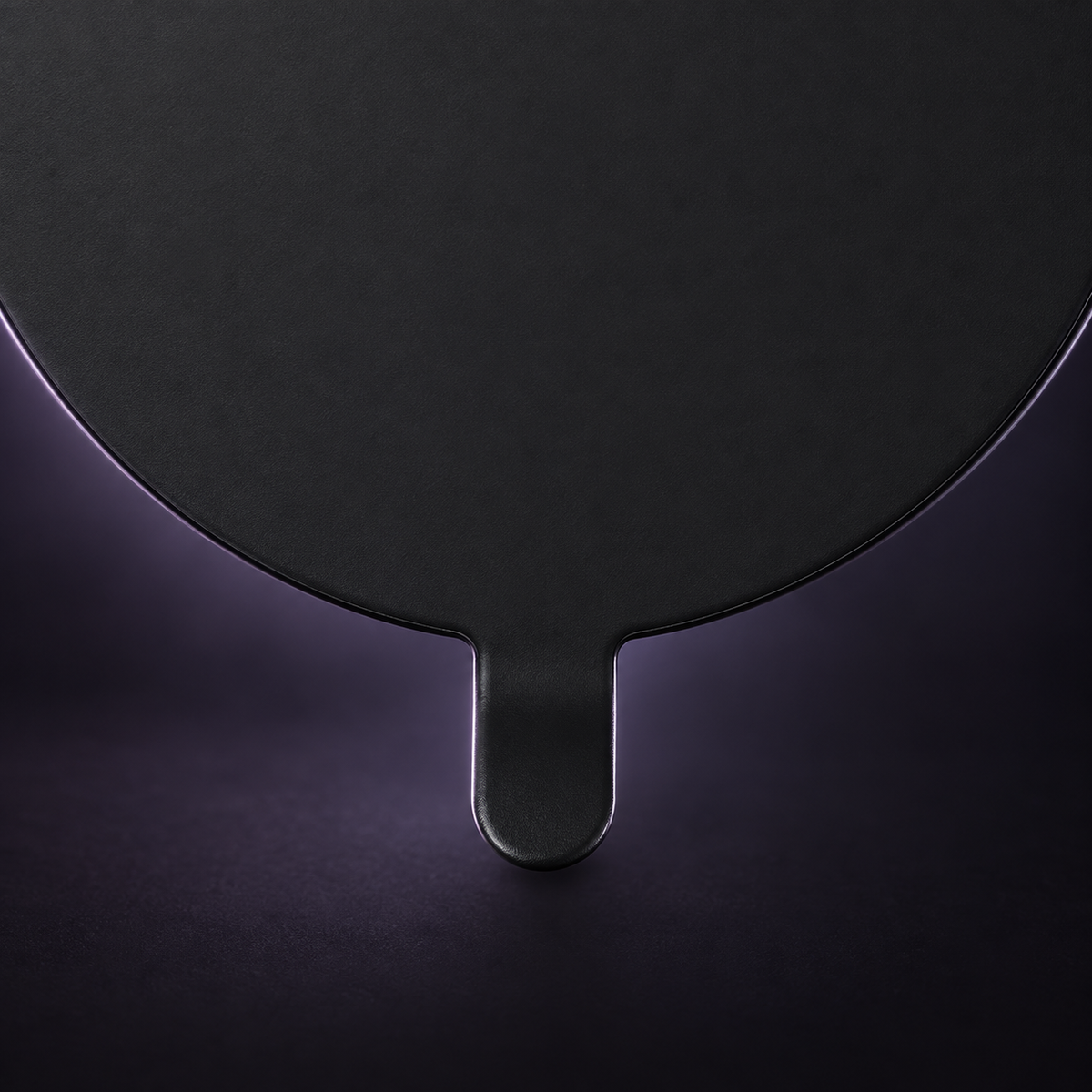 a visible lower tab: A small tab at the base of the circular cover. Text-free product reference.