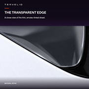 Close-up of the thin translucent sheet's curved edge beside the black port surround and white body panel.