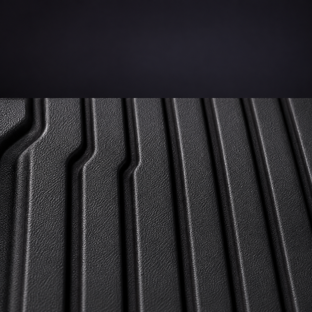 molded surface channels: A ribbed pattern across the floor surface.