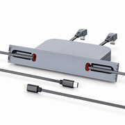 Original-style grey dual-connector charging hub on white, with USB-C and Lightning retractable leads and two rear input plugs.